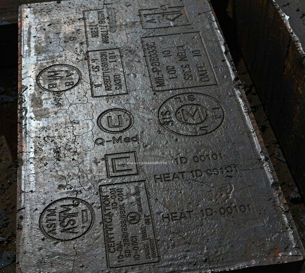 Stamped grade marking on a carbon steel billet
