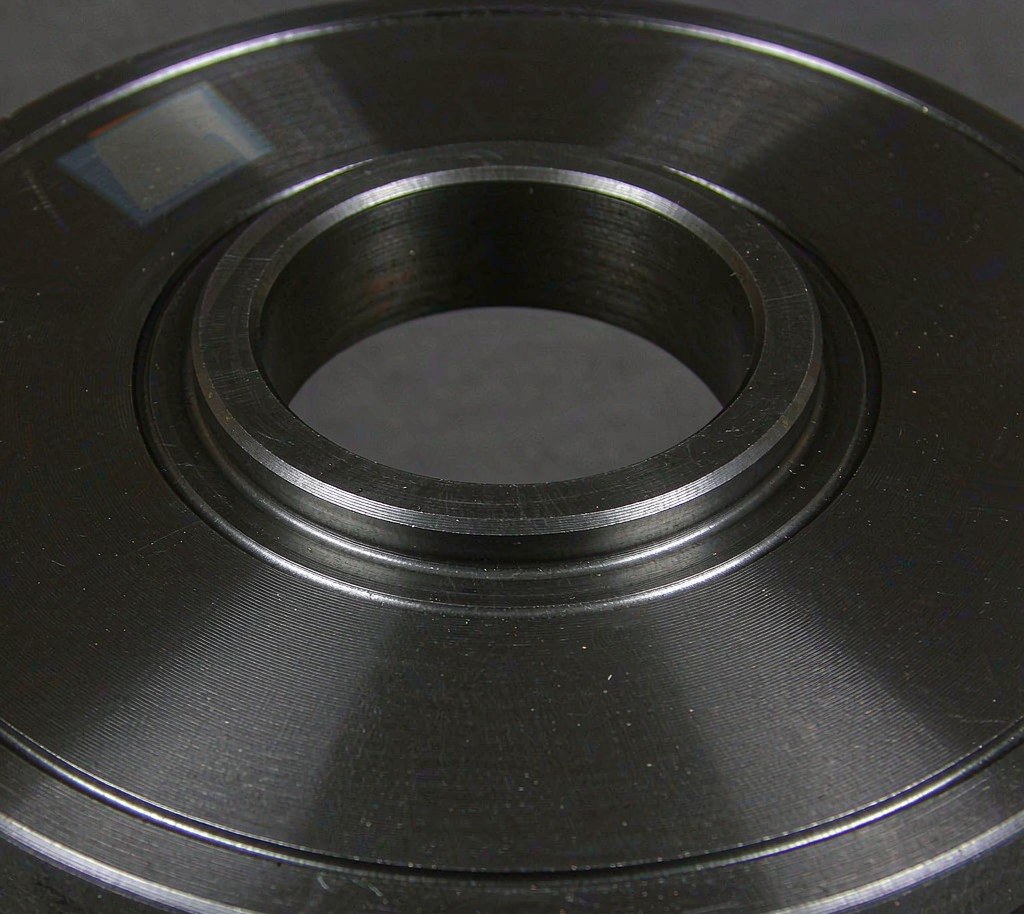 Machined raised face surface of a carbon steel flange