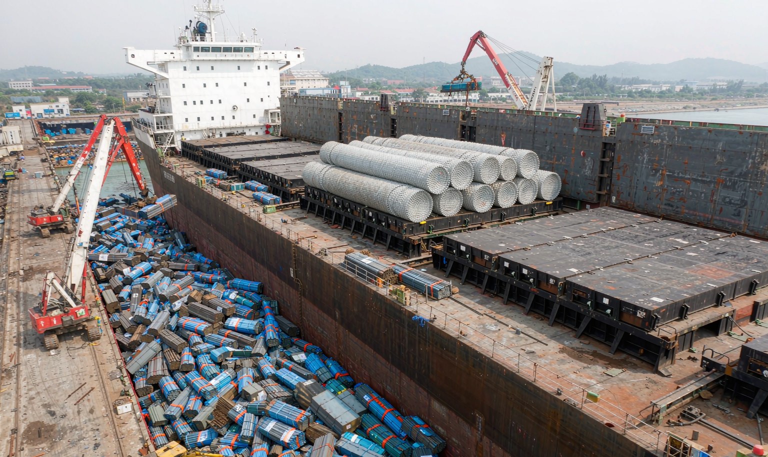 Cargo ship loaded with bundled steel for export