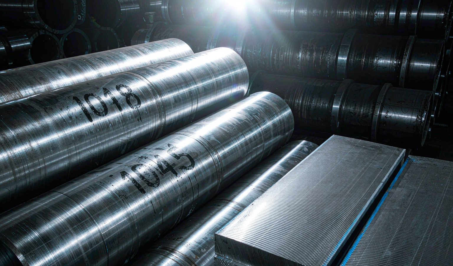 Comparison of AISI 4140 and 1045 carbon steel round bars