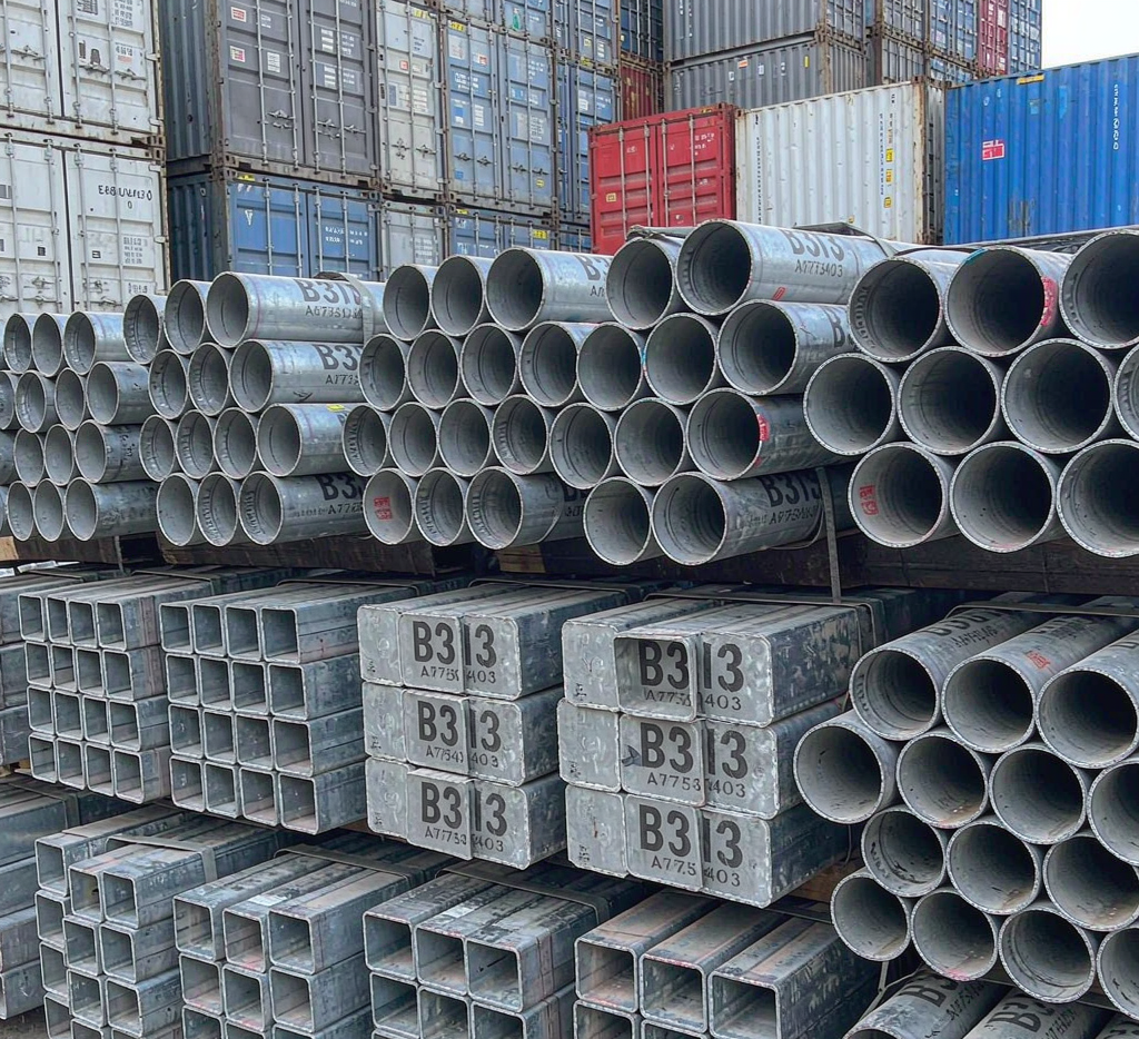 Stacked EN 10219 and ASTM A500 hollow sections ready for export