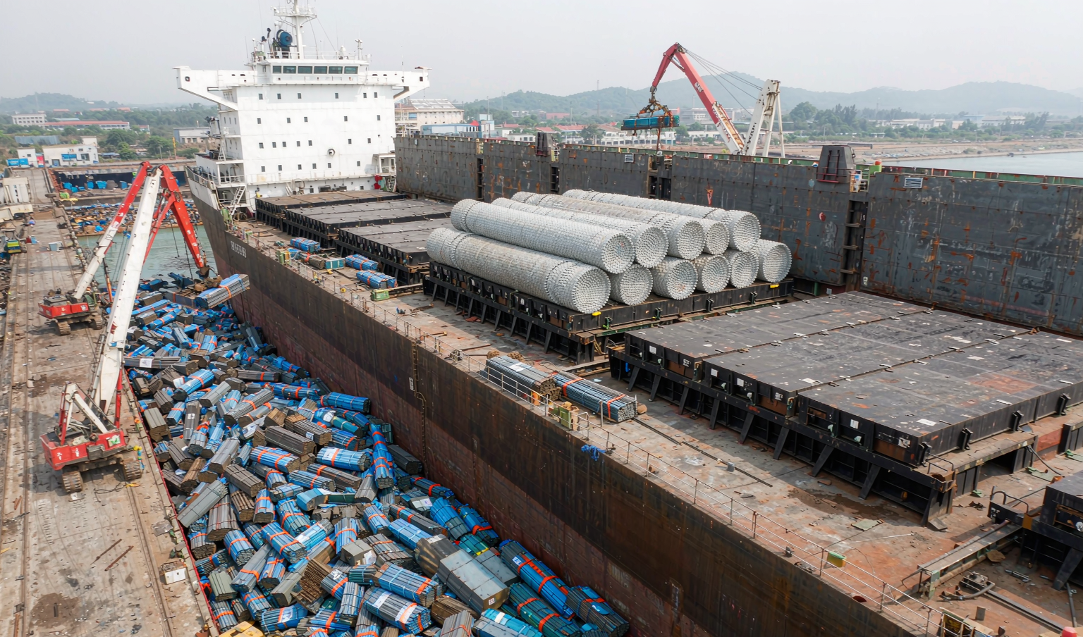 Steel bundles loaded into container for export