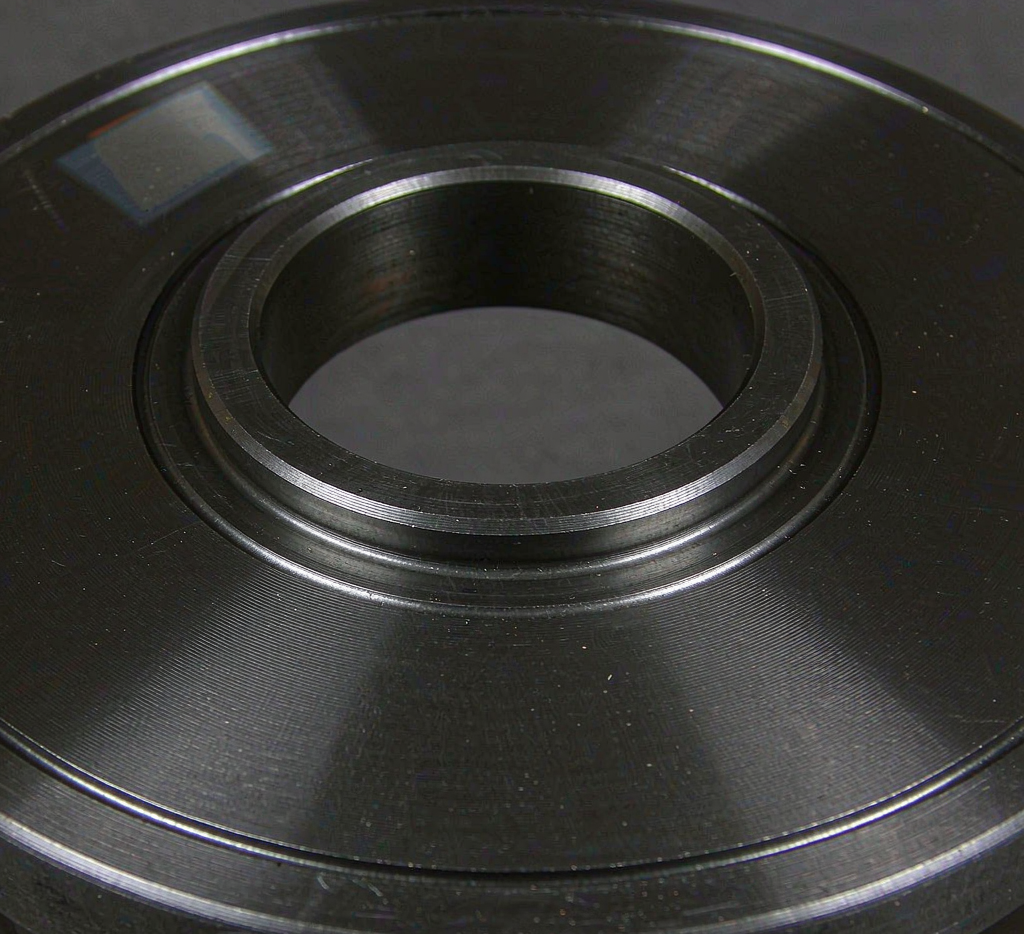 CNC machining of carbon steel weld neck flange facing