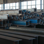 S235JR Steel Equivalent: EN 10025 Grades Explained s235jr-structural-steel-warehouse.png