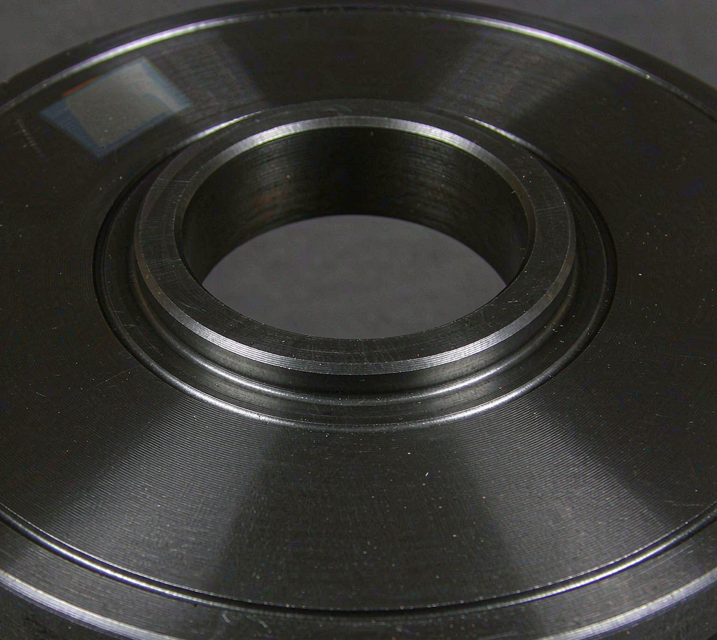 Machined facing surface of a carbon steel plate flange