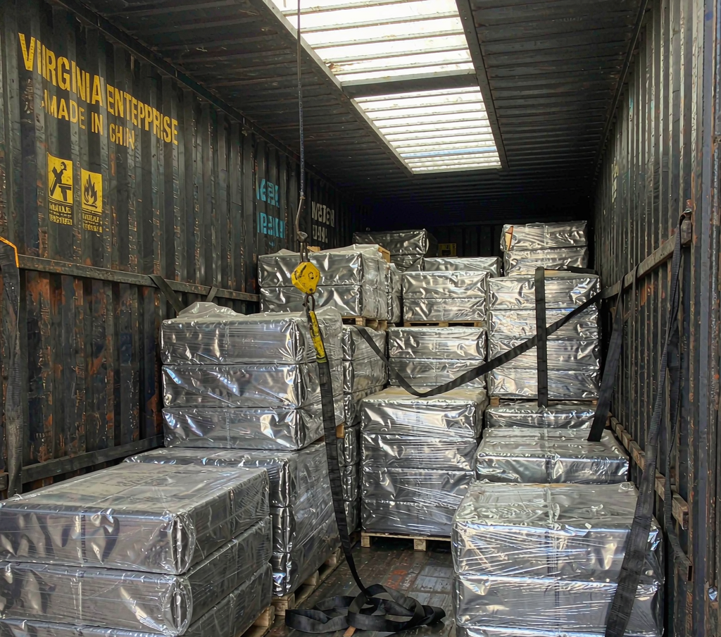 Steel bundles loaded and secured on truck for export delivery